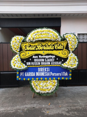 Papan Bunga Duka di Pagar Merbau